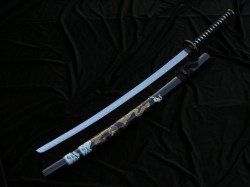 Przejdź do produktu CZARNA KATANA Z WYRAZISTYM MOTYWEM SMOKA