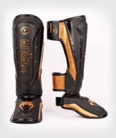 VENUM ELITE EVO OCHRANIACZ GOLENI I STOPY - BLACK/BRONZE